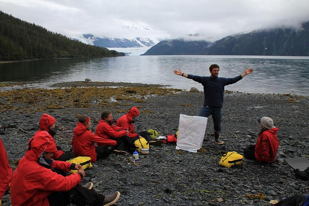 Instructor Sean Williams gives a class on glaciology, Prince William Sound, Alaska'