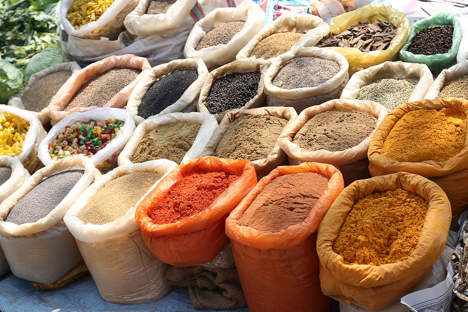 bags of bulk food, including spices and pasta