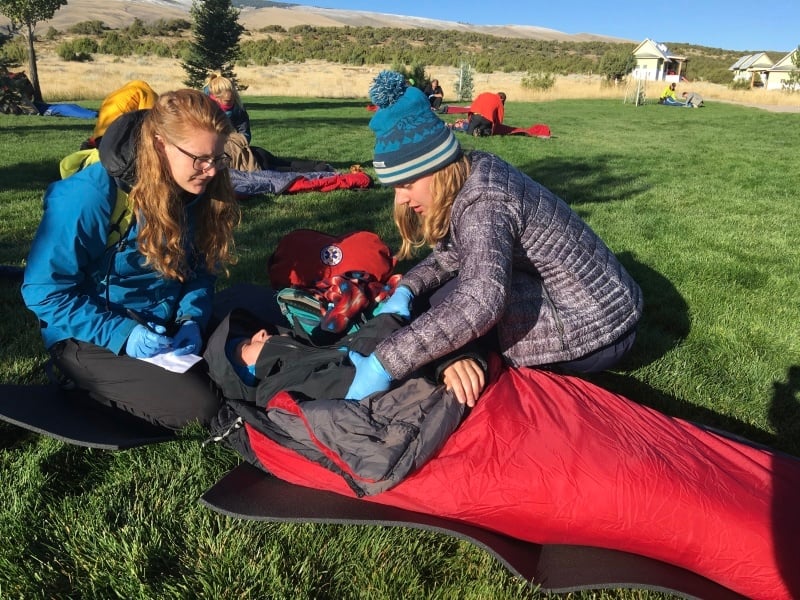 Wilderness Medicine students practice warming a student