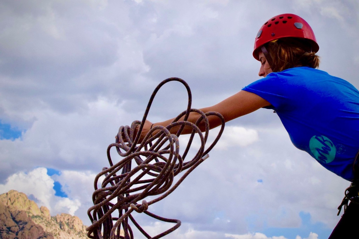 Person preparing to rappel