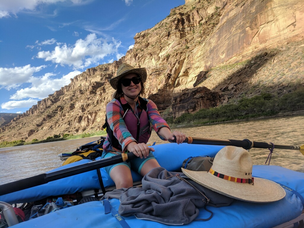 Ashley paddling the raft