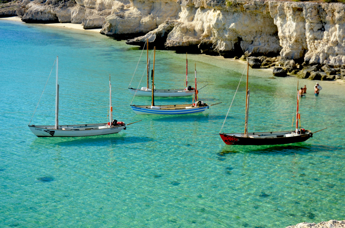 Four Drascombe Longboats anchored