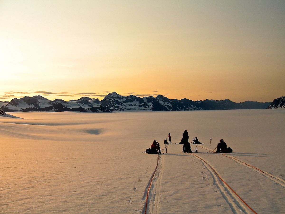 NOLS rope team pauses to rest while mountaineering in Alaska