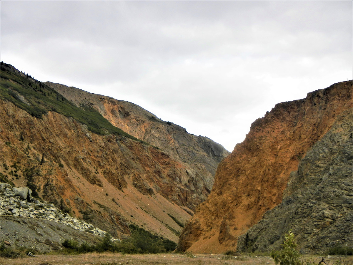 reddish orange slopes on the Alsek River