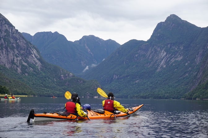 Two people sea kayaking in Alaska