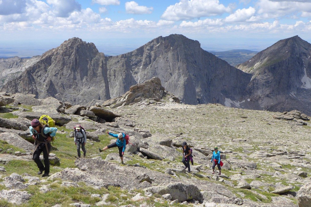 A group of backpackers hikes uphill in the Brooks Range of Alaska