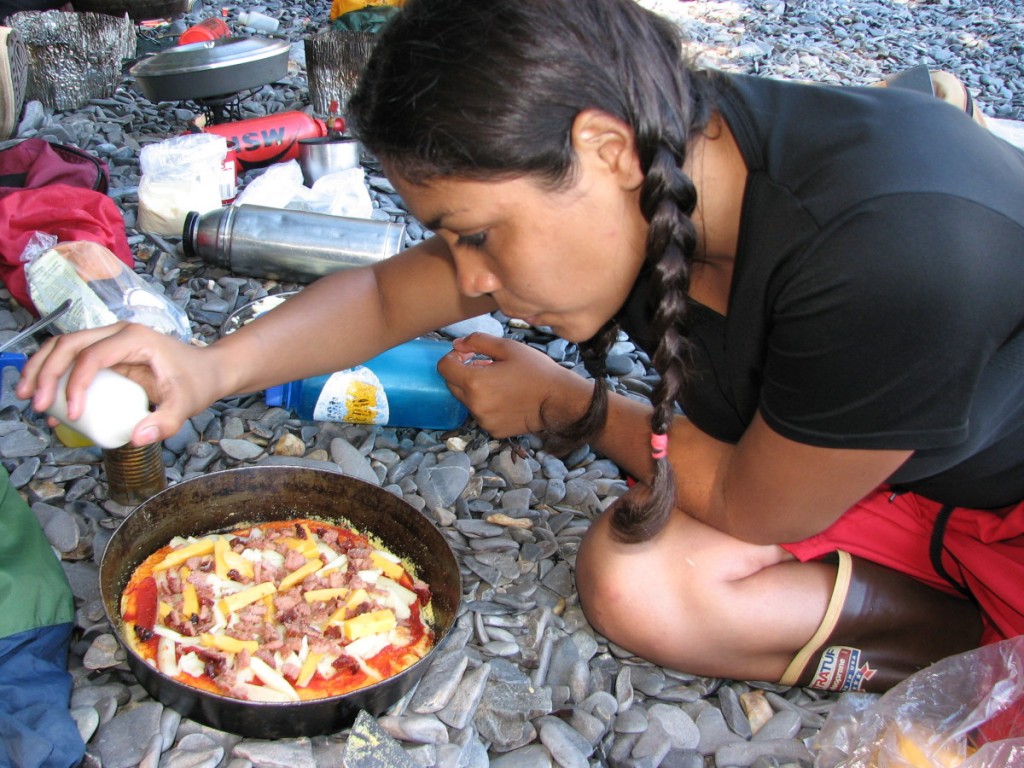 Seasoning backcountry pizza